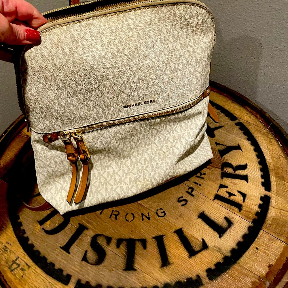 Authentic Michel Kors backpack purse.